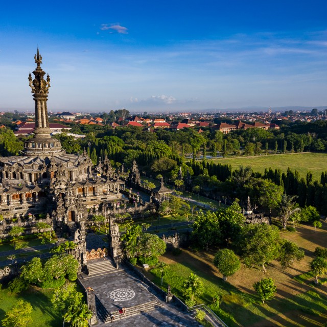 Aerial view taken by drone of the Bajra Sandhi famous monument in Renon area and surrounded with trees and gardens in central Denpasar in Bali.