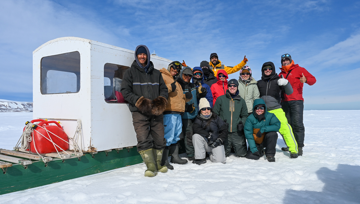 Narwhal and polar bear tour group photo